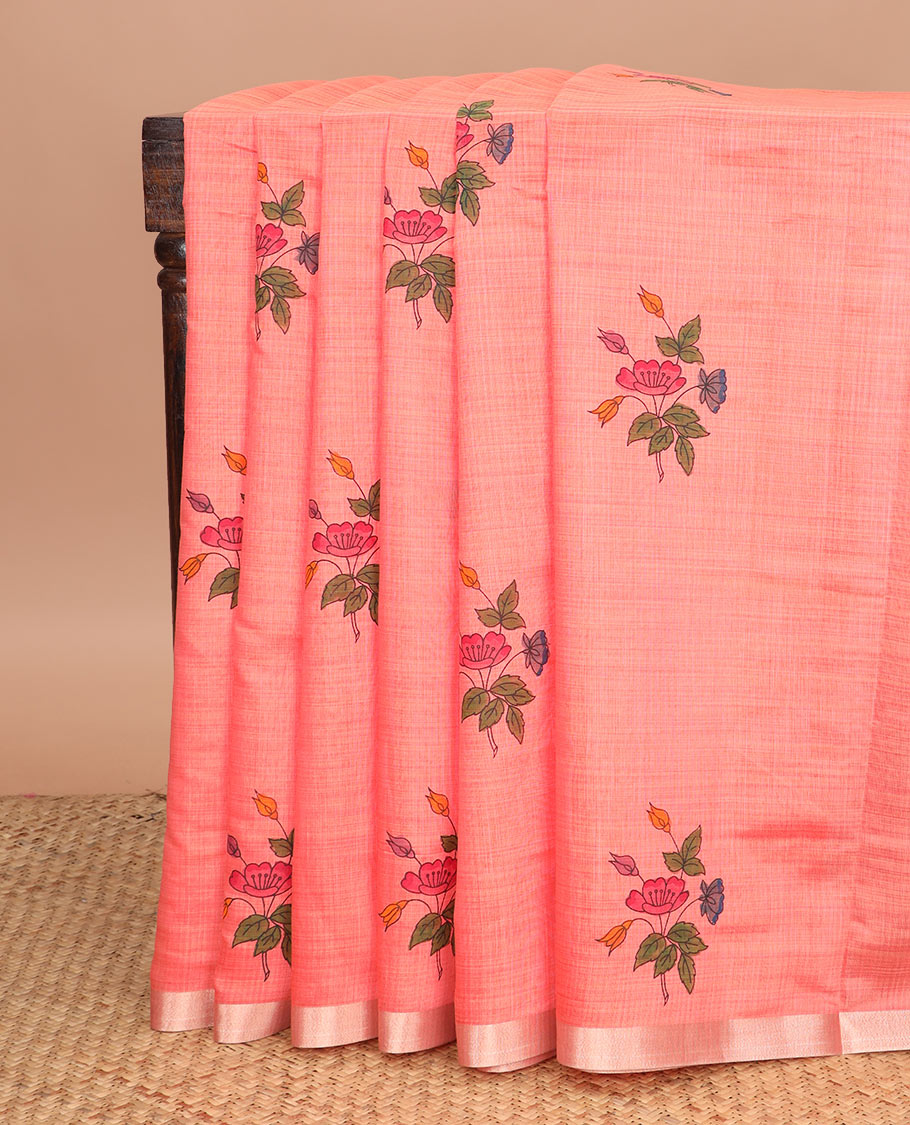 Peach floral buttas printed chirala cotton saree, bavanji border, and contrast chakram motifs pallu