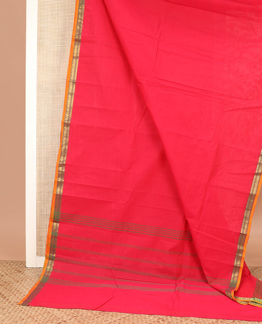 Red plain Chettinad cotton saree, contrast traditional zari border, and striped pallu