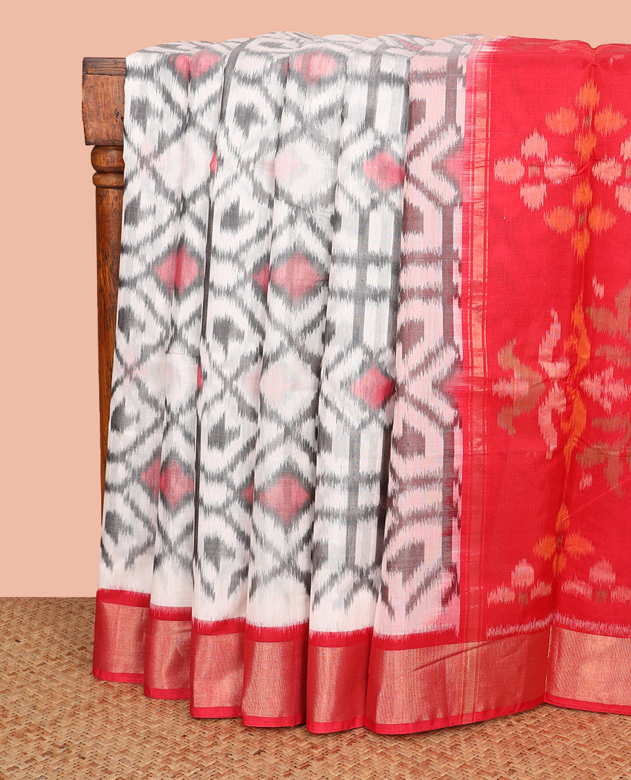 Off-White Ikkat Cotton Saree, Delicately Woven with Ikkat-Style Geometric Patterns All Over Its Body, Complemented by a Contrast Border, Pallu of Floral Designs in Ikkat Weave, and Paired with a Contrast Blouse
