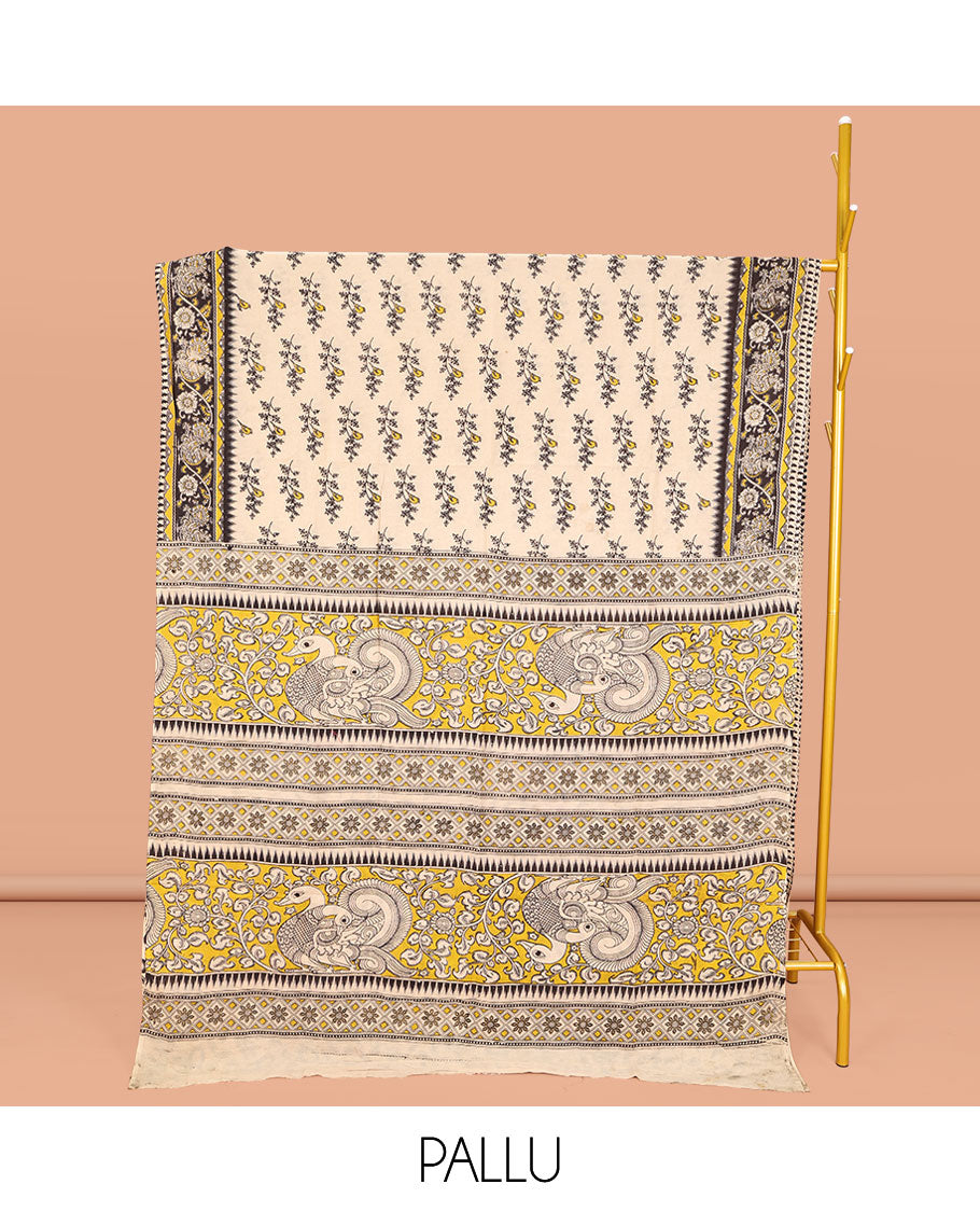 Cream Machine-Printed Kalamkari Cotton Saree, Decked Up with Floral Motifs on Its Body, Complemented by a Contrast Floral Printed Border, Pallu of Kalamakri Peacock Print, and Paired with a Printed Blouse
