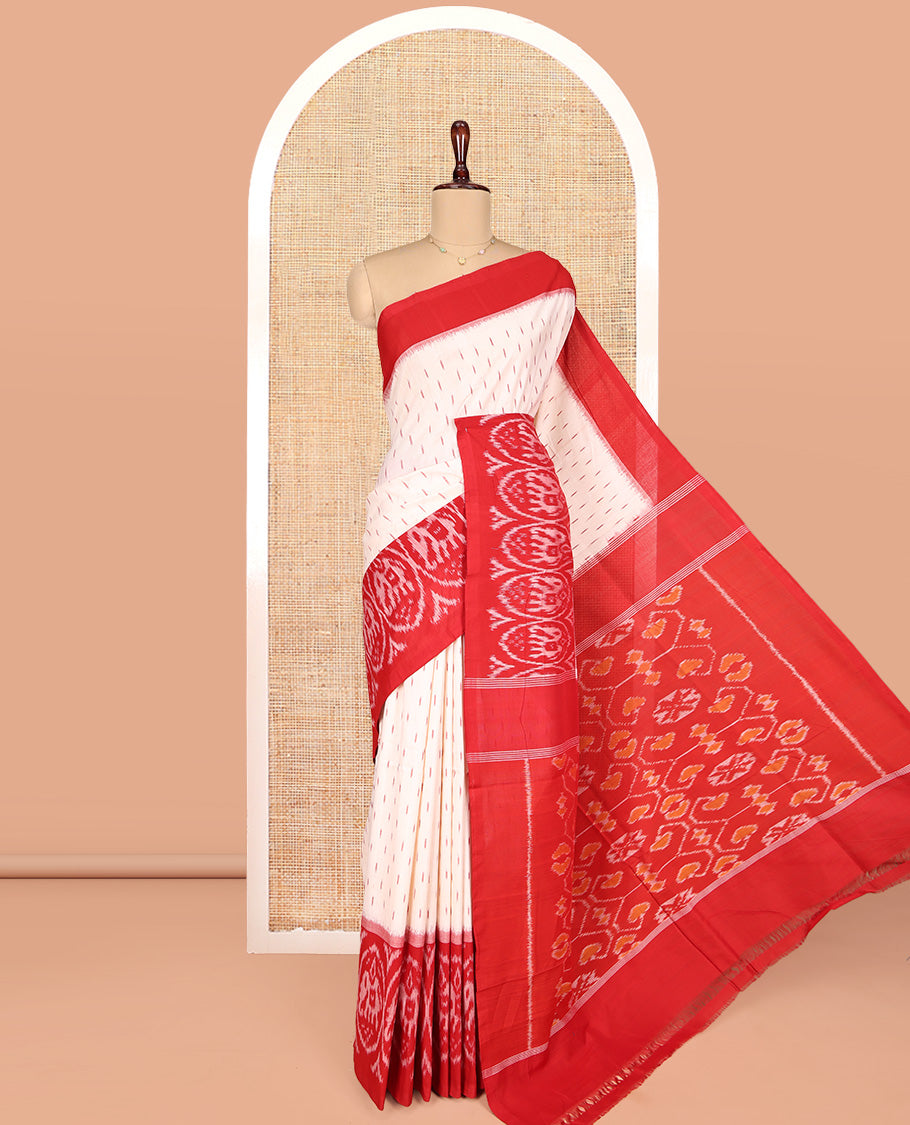 Cream Ikkat Cotton Saree, Features Ikkat Buttas All Over Its Body, Complemented by a Contrast Ikkat-Style Round Elephant Border, Intricately Designed Pallu, and Has No Blouse