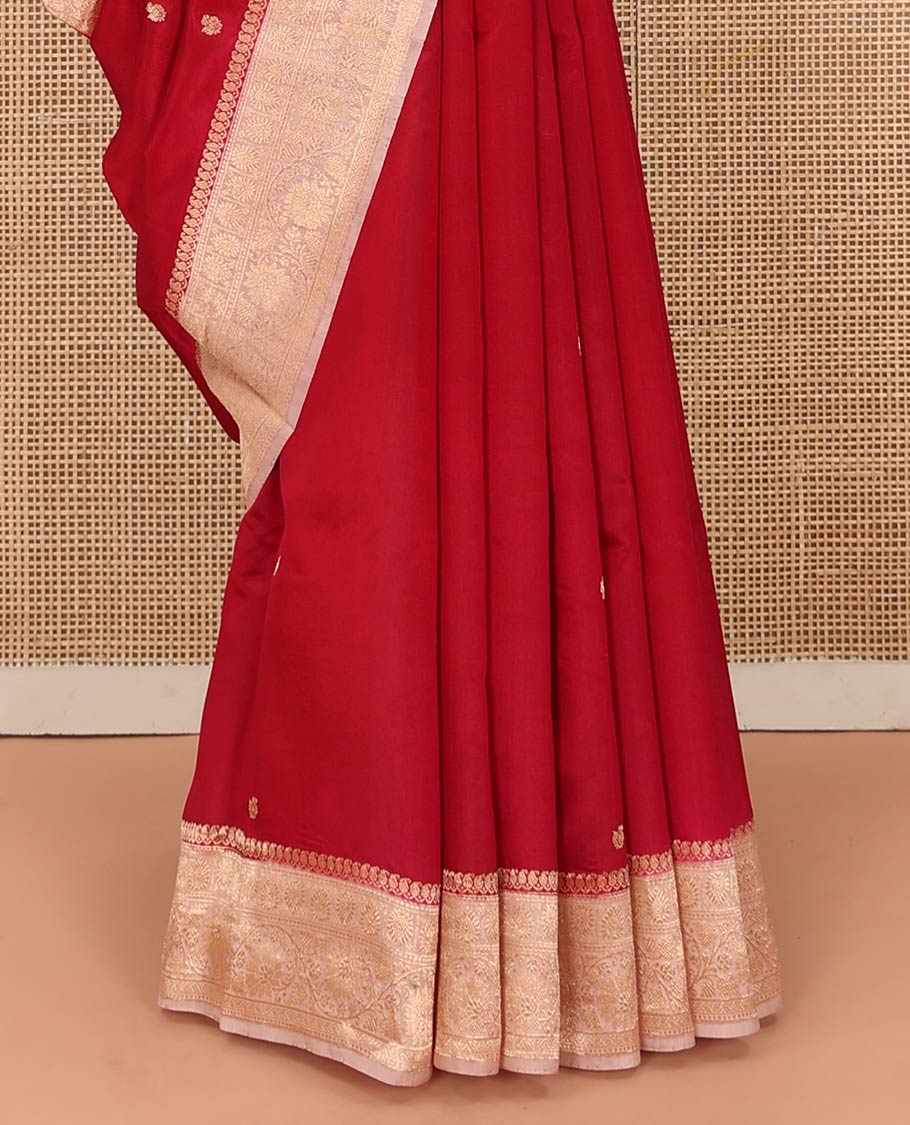 Red Raw Mango Silk Saree Decorated with Buttas, Featuring a Contrast Floral Creeper Zari-Designed Border, a Pallu Adorned with Chevron Zari Designs, Paired with a Contrast Blouse