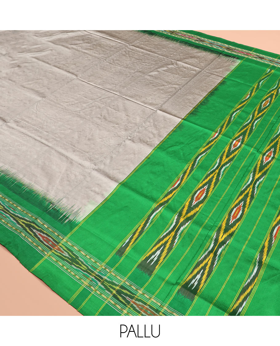 Grey Plain Ikkat Silk Saree with a Contrast Green Border Decked with a Hazy Ikkat Weave, Featuring a Pallu Flanked by Stripes and Ikkat Texture