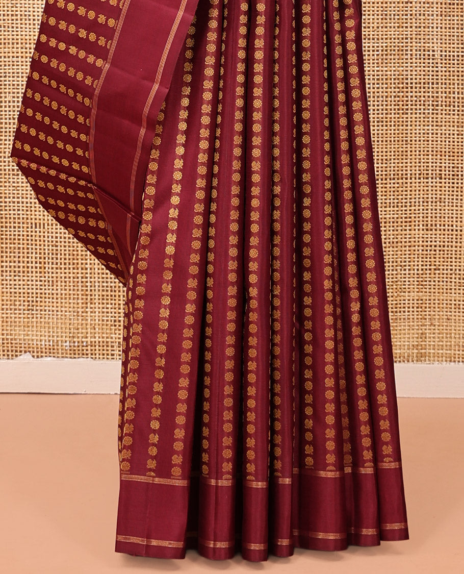 Light Maroon Kanchipuram Designer Silk Saree, Steeped in Richness of Mayil-Chakram Buttas, a Subtle Bodi Border, Butta-Enclosed Checked Pallu, and a Matching Blouse