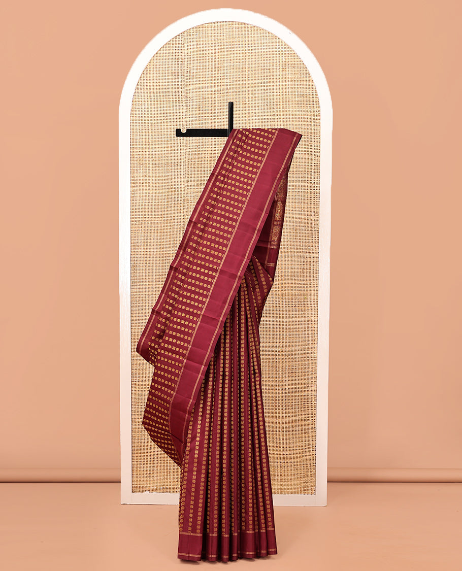 Light Maroon Kanchipuram Designer Silk Saree, Steeped in Richness of Mayil-Chakram Buttas, a Subtle Bodi Border, Butta-Enclosed Checked Pallu, and a Matching Blouse