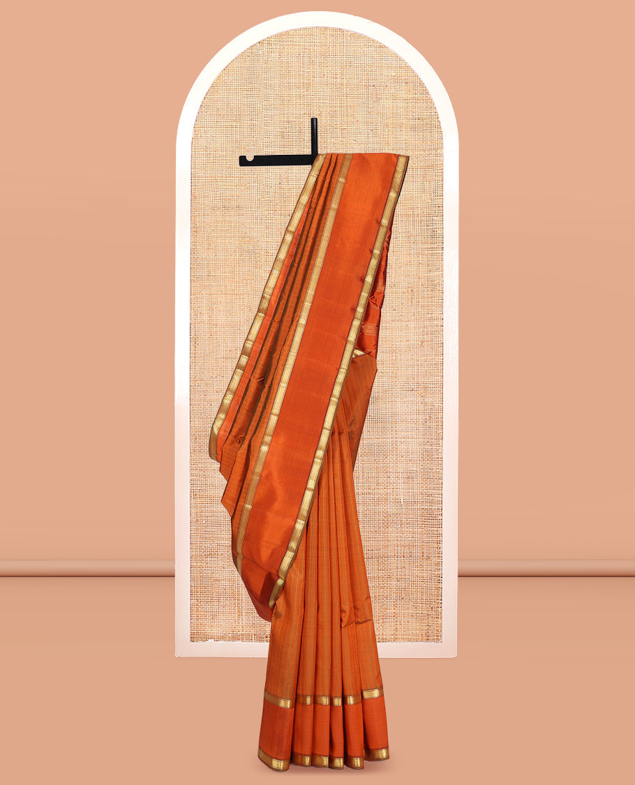 Orange Kanchipuram Silk Saree, Sparsely Woven with Muthu Zari Stripes, Highlighted by Rettai Pettu Traditional Border, Zari Striped Pallu, and a Matching Blouse