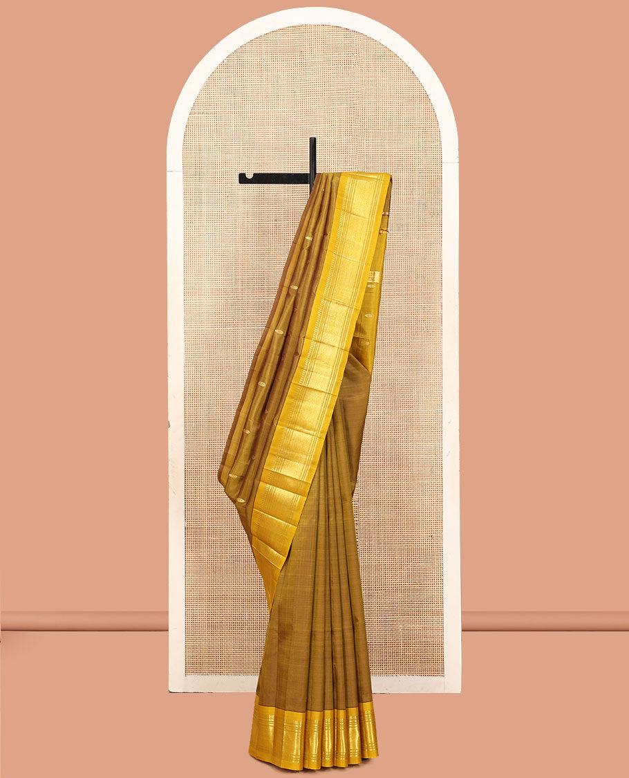 Green Kanchipuram Silk Saree, Elevated with Zari Buttas, a Contrast One-Sided Border of Paneer Sombu, Banaras, Muthu, and Jaal Designs, a Zari Design Pallu, and No Blouse