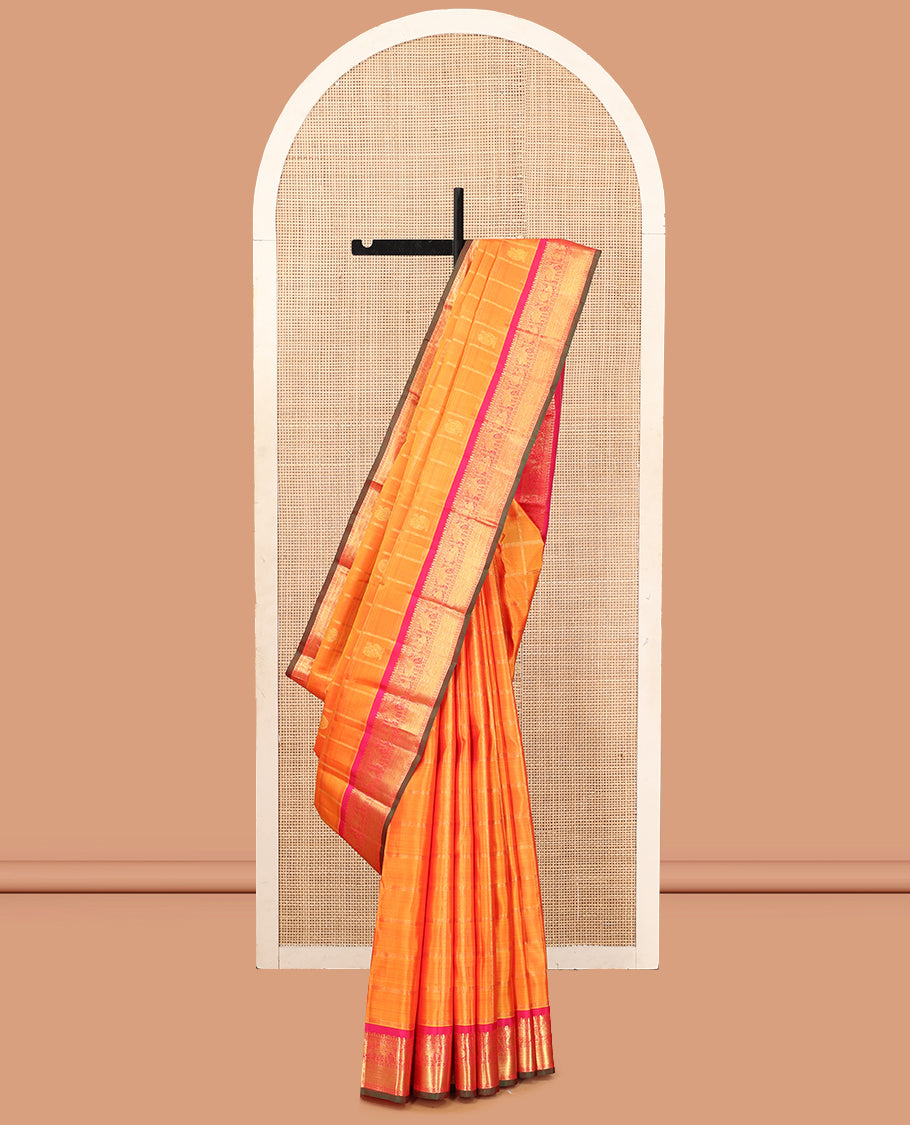 Orange Kanchipuram Silk Saree, Adorned with Mayil-Chakram Buttas and Stripes, Complemented by a Contrast Border of Thilakam Mokku, Rudraskham, Mayil, and Yaanai Design, Jaal Pallu, and a Contrast Blouse