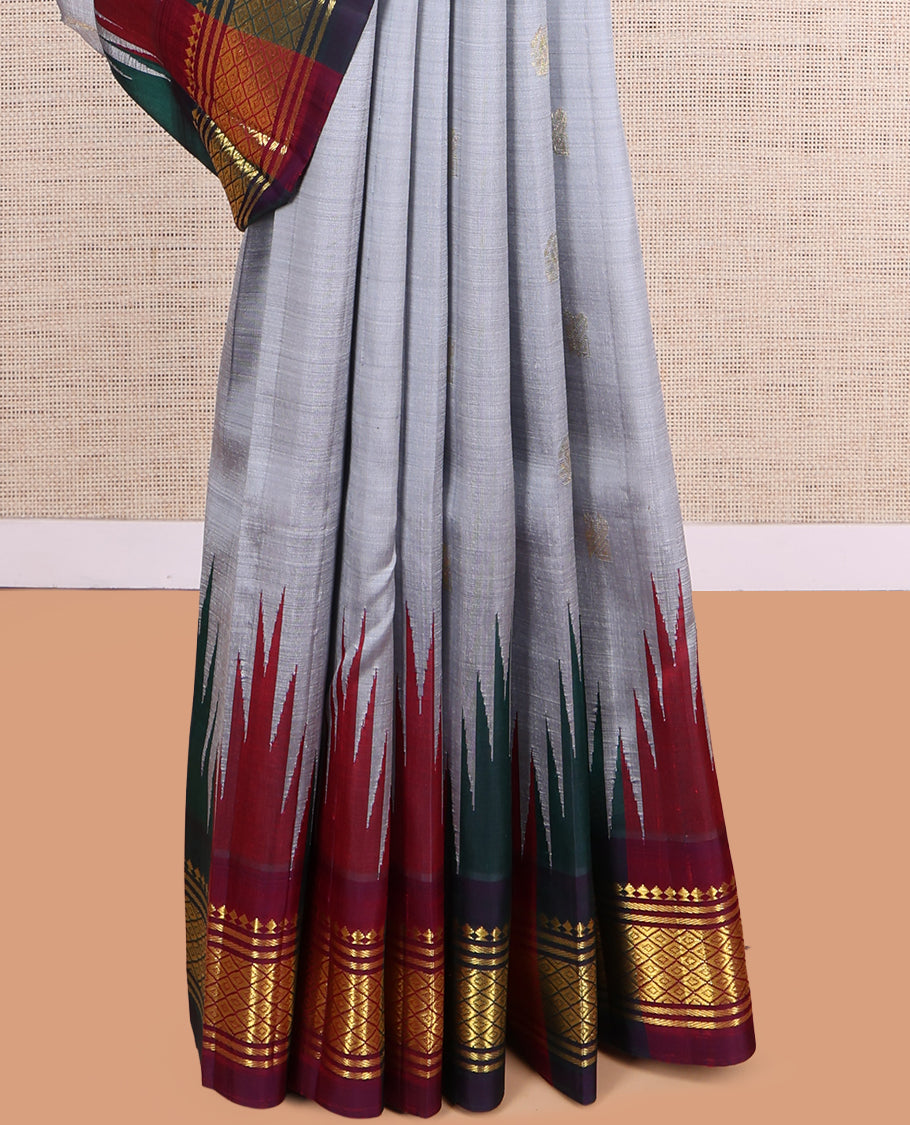 Grey Kanchipuram Silk Saree, Elevated with Zari Buttas, a Contrast One-Sided Border of Thazhampoo Rekku, Paneer Sombu, Banaras and Mayil Kann Design, Zari Design Pallu, and No Blouse