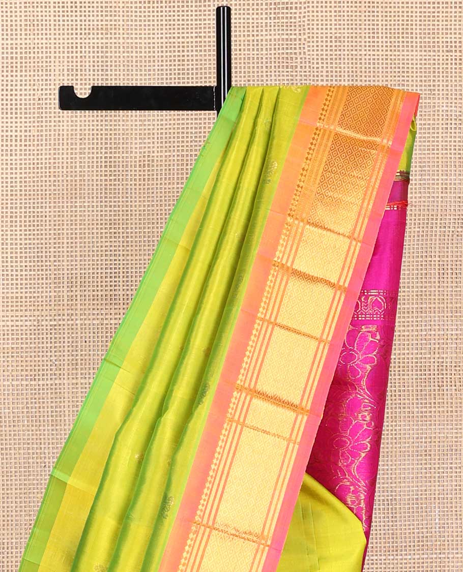 Light green buttas kancheepuram silk saree with contrast border of thilakam moku, banaras, kuyil kann design & zari design pallu