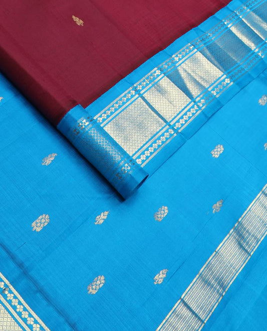 Maroon zari buttas kanchipuram silk saree, contrast one-sided korvai border of lavangam & mayil kann designs & zari design pallu