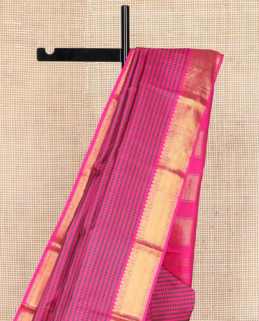Pink striped Kanchipuram silk saree, zari border of traditional designs, and pallu of zari designs
