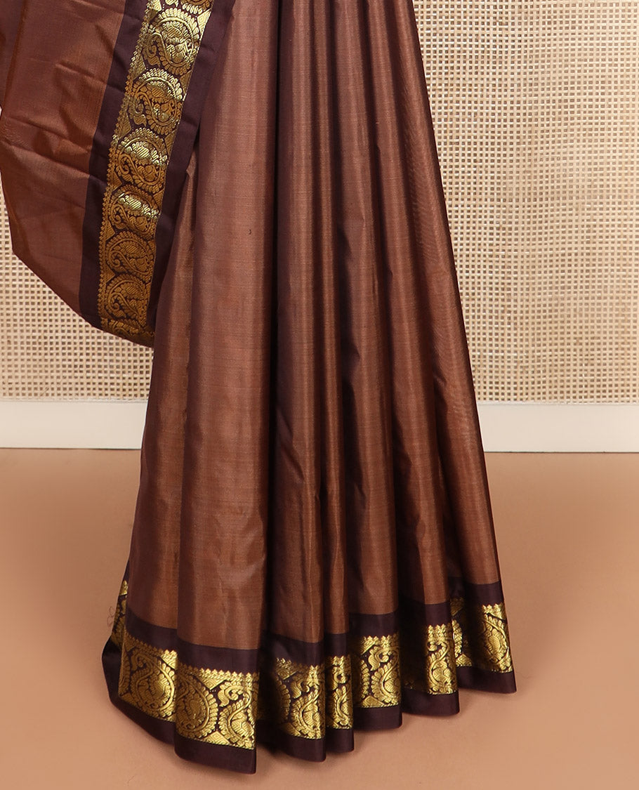 Brown zari buttas Kanchipuram silk saree, contrast mayil enclosed manga zari border, and zari design pallu