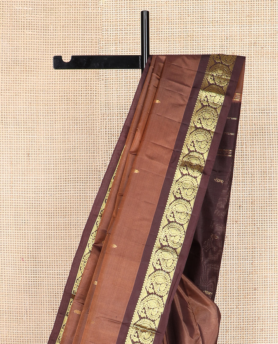 Brown zari buttas Kanchipuram silk saree, contrast mayil enclosed manga zari border, and zari design pallu