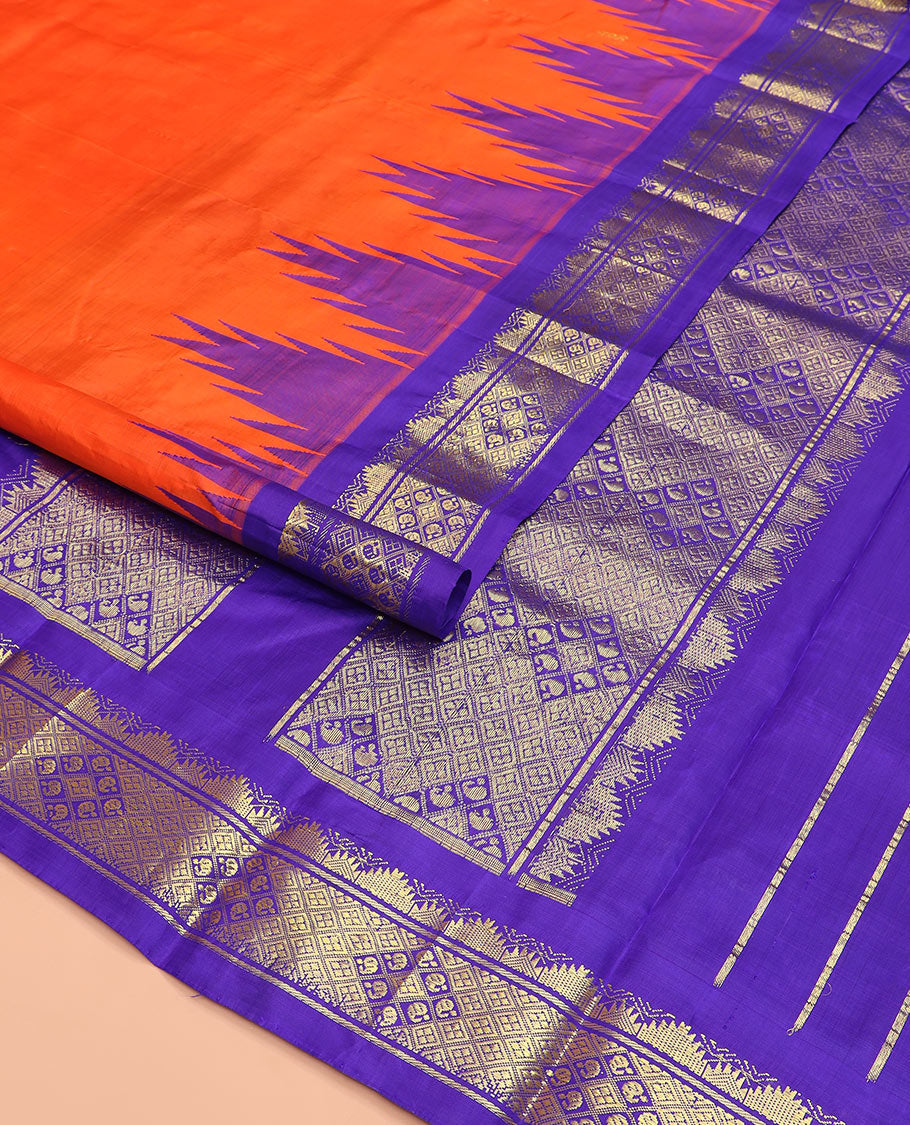Orange zari buttas Kanchipuram silk saree, contrast thazampoo rekku border, and pallu of intricate zari designs