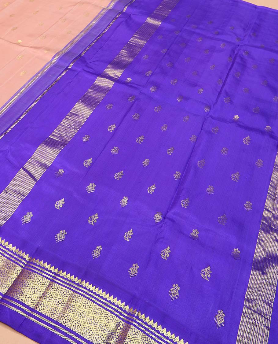 Peach zari buttas Kanchipuram silk saree, contrast one-sided korvai border of thilakam mokku, banaras, and jaal designs, and zari design pallu