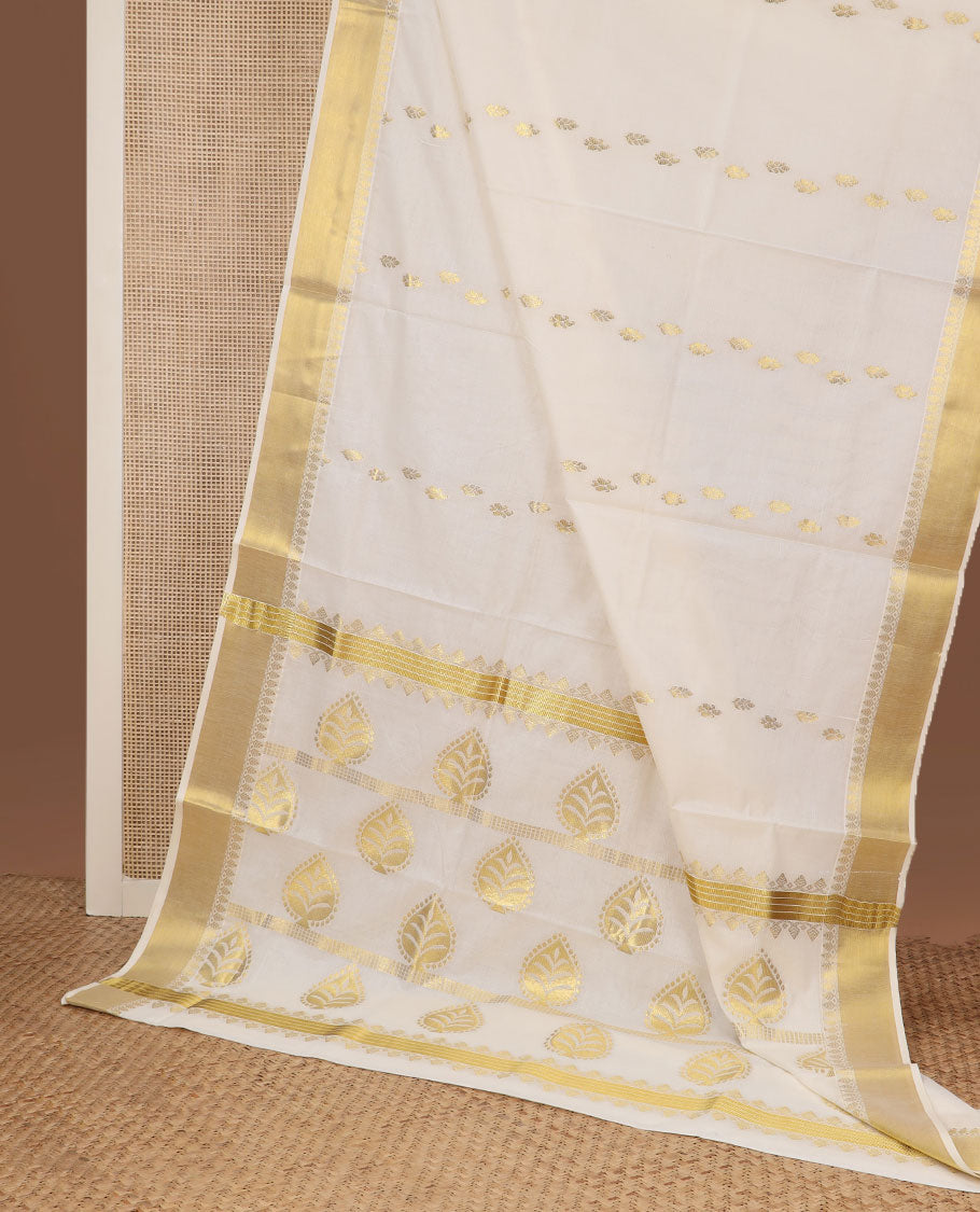 Cream zari buttas Kerala saree, zari border, and pallu of spade shape motifs