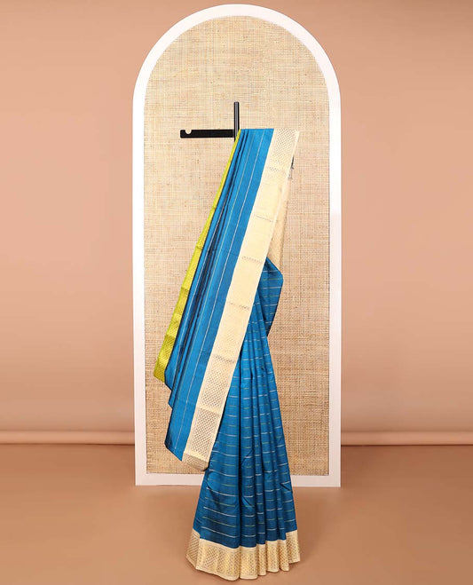 Blue striped kancheepuram silk saree with contrast ganga jamuna, korvai border of ara madam design & ogee design pallu