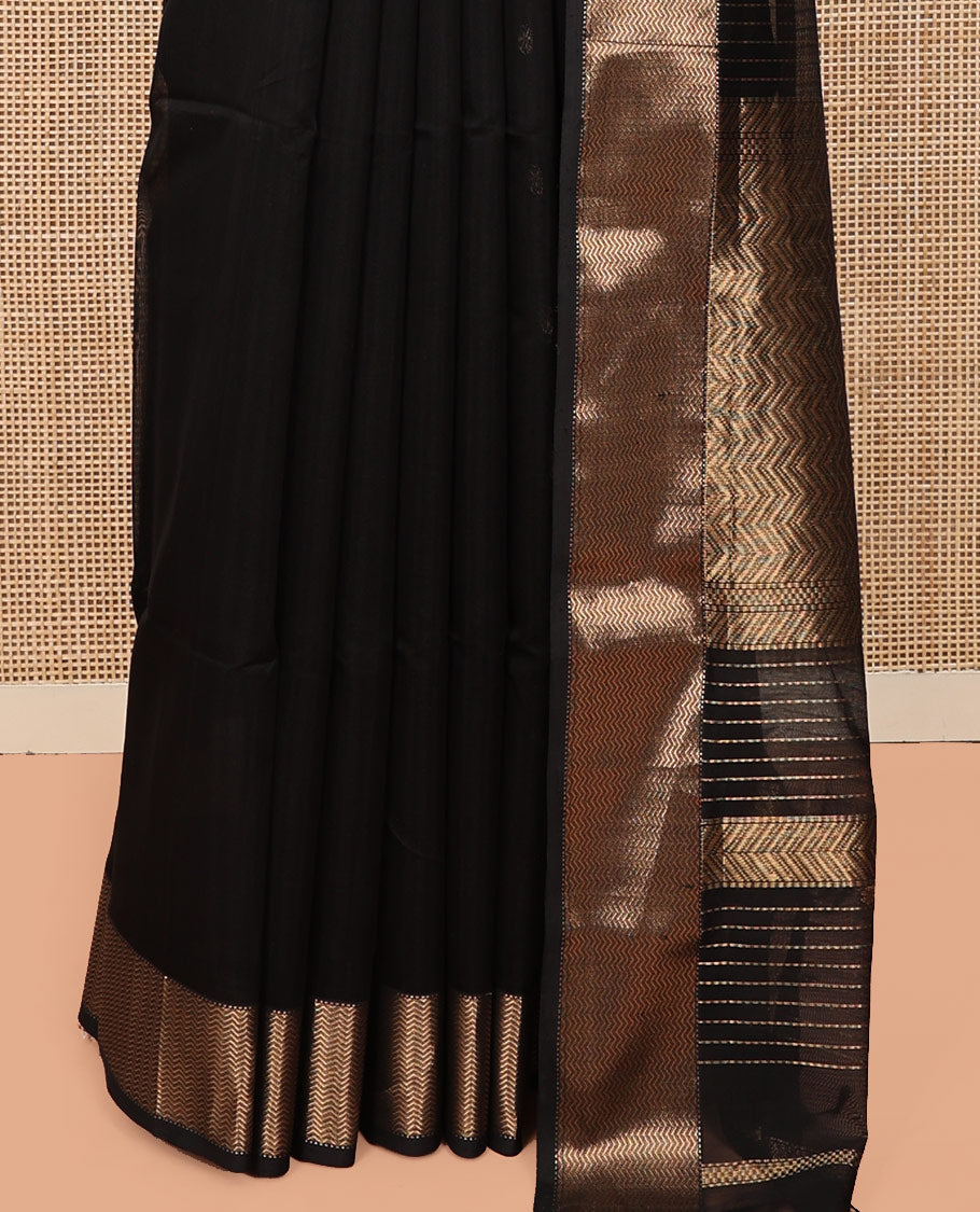 Black Maheshwari Cotton Saree, Spotlighted by Buttas All Over Its Body, Highlighted by a Traditional Zari Border of Chevron Stripes, Pallu of Chevron Stripes, and Paired with a Matching Blouse