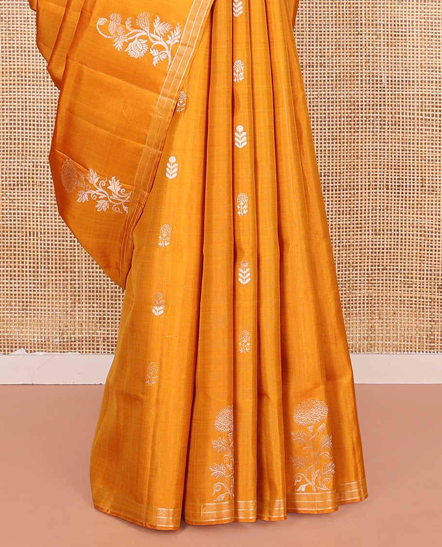 Orange Mayuri Soft Silk Saree, Elegantly Woven with Floral Zari Buttas on Its Body, Subtle Piping Border, Majestically Detailed Pallu, and Paired with a Matching Blouse