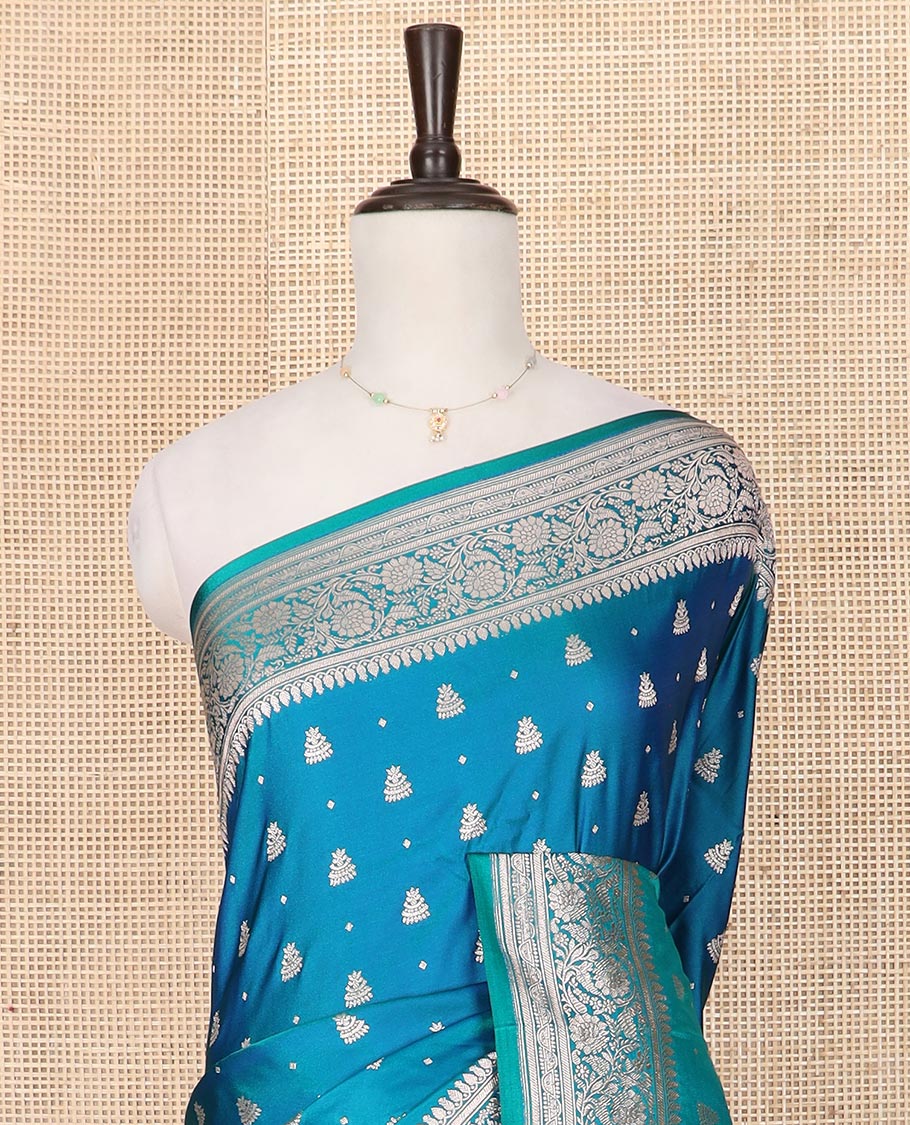 Blue zari buttas mushru silk saree, floral creeper design border, and intricately designed pallu