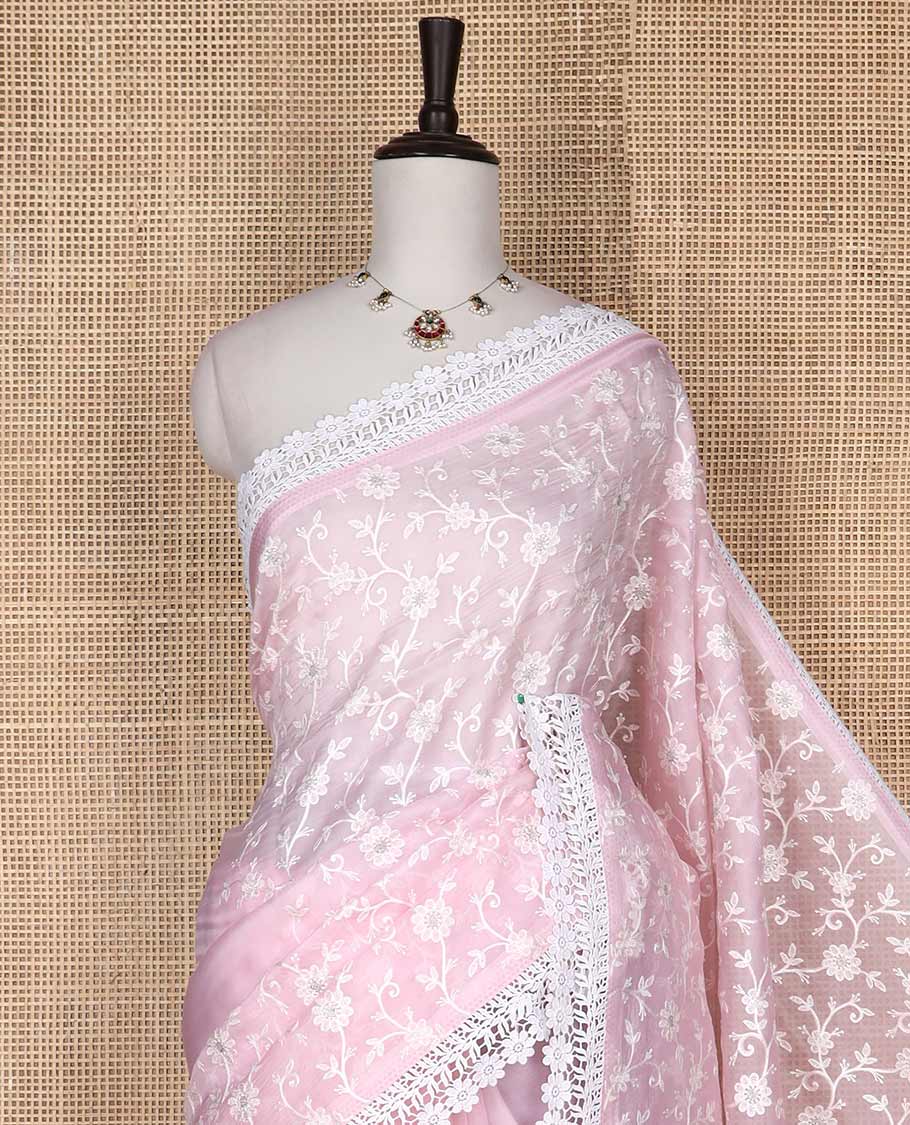 Light pink floral thread embroidery organza saree with lace border