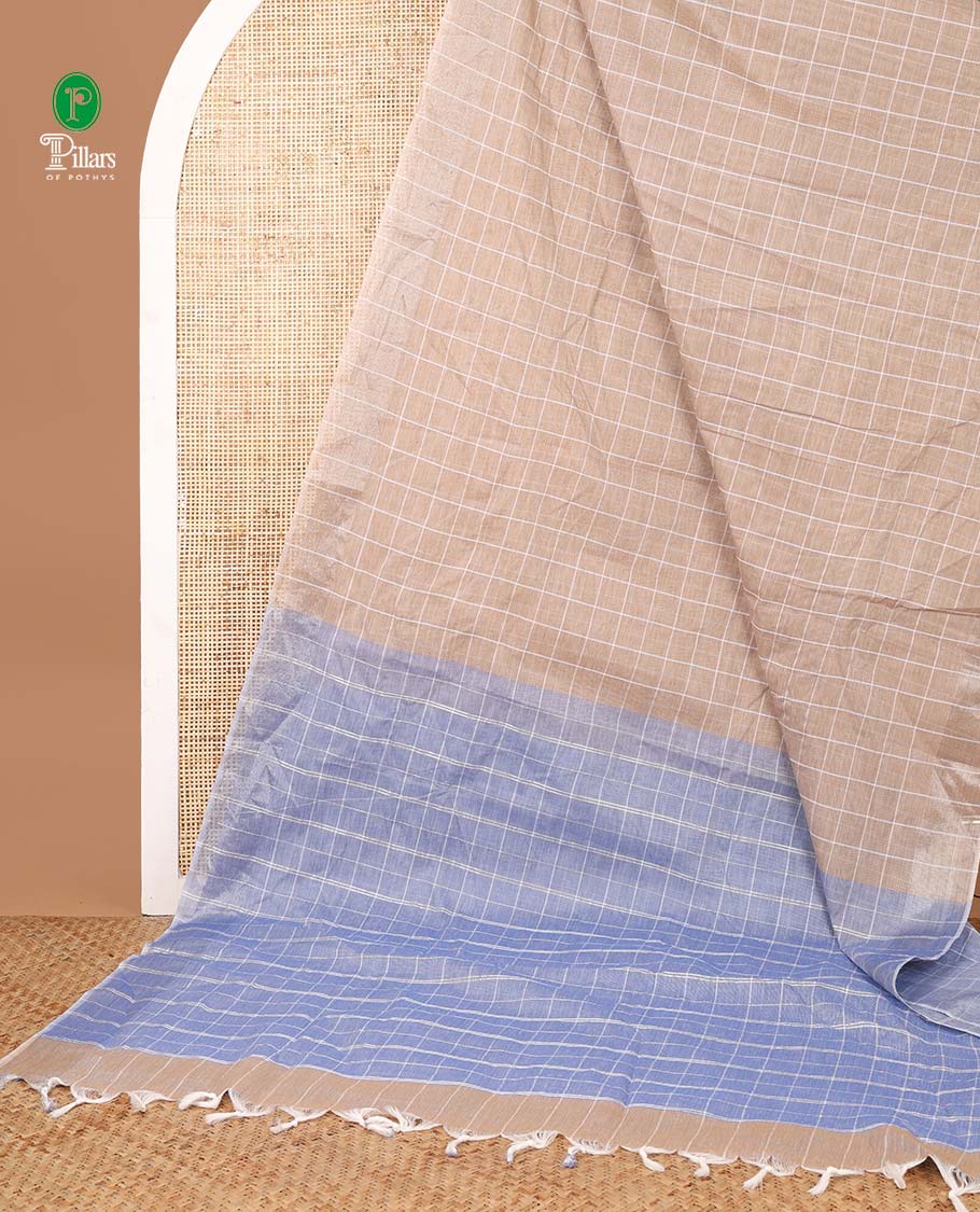 Chikku color checks jute cotton saree with zari border & zari checks pallu along with checks blouse