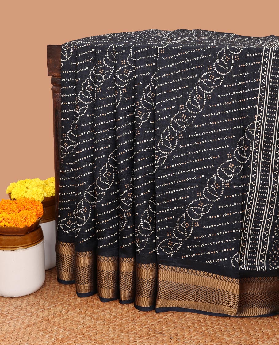 Black all-over bandani print dola silk saree with contrast copper thread gatt border & bandhani print blouse
