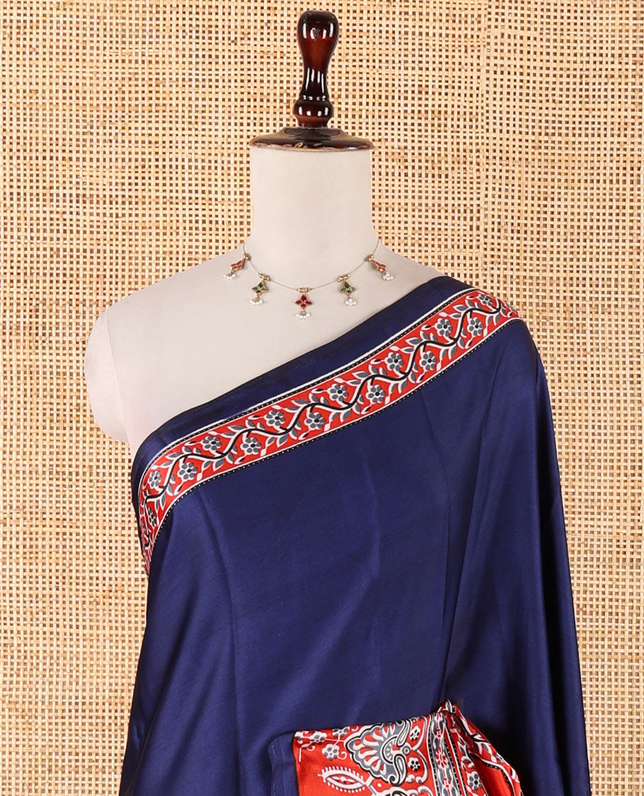 Blue half-plain & half-printed gajji silk saree, contrast red border & pallu of ajrakh-print with printed blouse