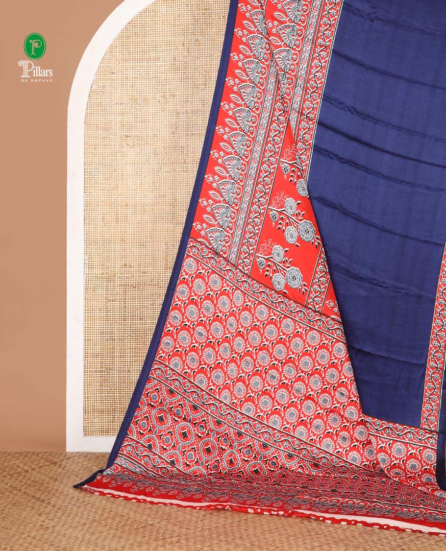 Blue half-plain & half-printed gajji silk saree, contrast red border & pallu of ajrakh-print with printed blouse