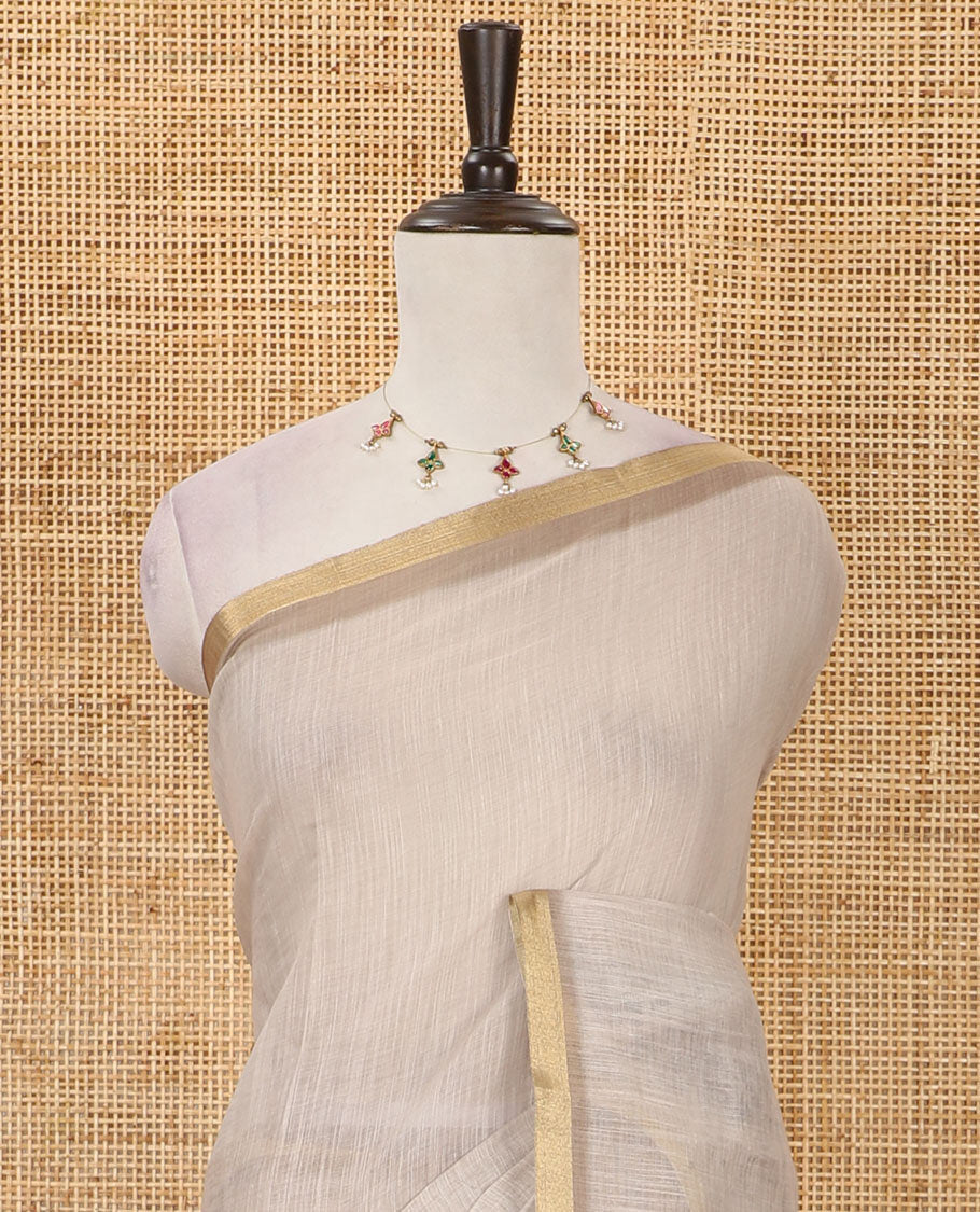 Chikku plain & giraffe motifs printed linen cotton saree, zari piping border, giraffe printed pallu & vertical striped blouse