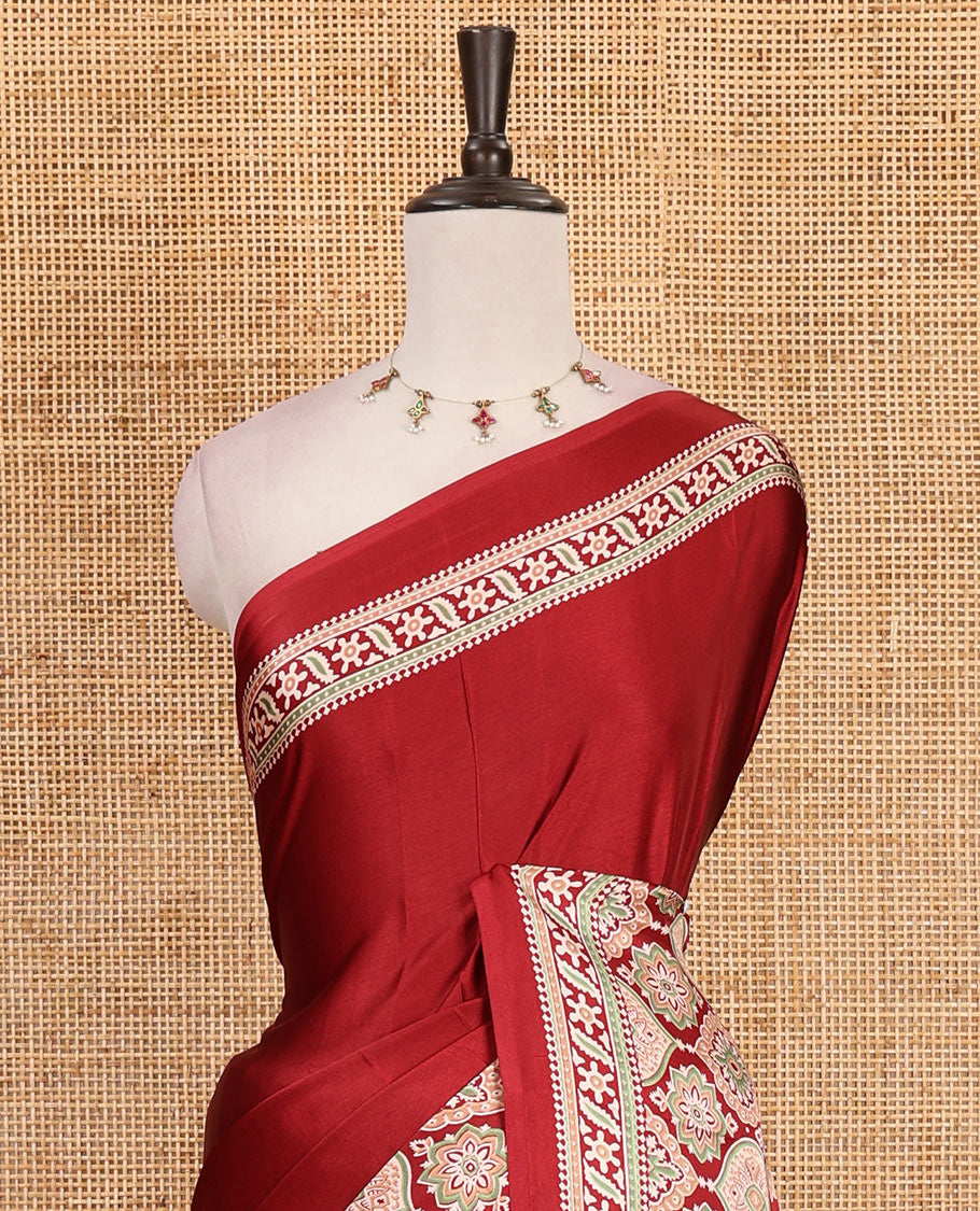 Maroon plain gajji silk saree with ajrak printed border, ajrak printed geometric pallu, and printed blouse