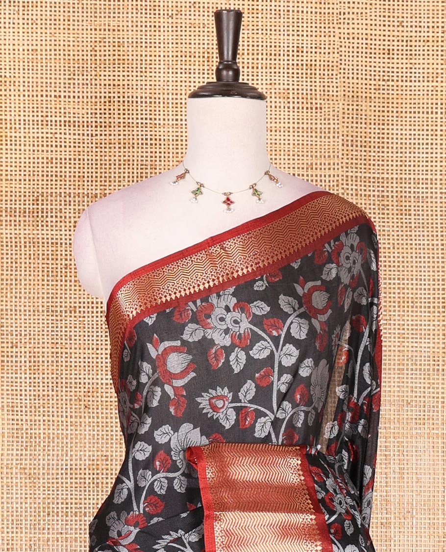 Black Kalamkari floral vine and peacock printed dola silk saree, contrast traditional zari border, peacock printed pallu, and floral vine print blouse
