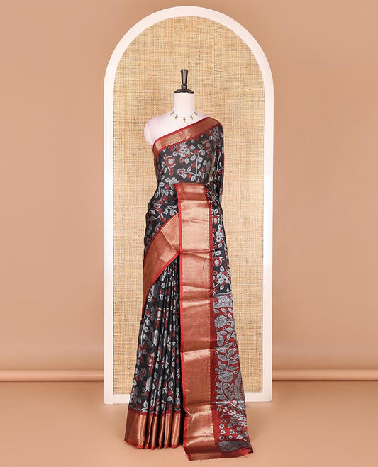 Black Kalamkari floral vine and peacock printed dola silk saree, contrast traditional zari border, peacock printed pallu, and floral vine print blouse