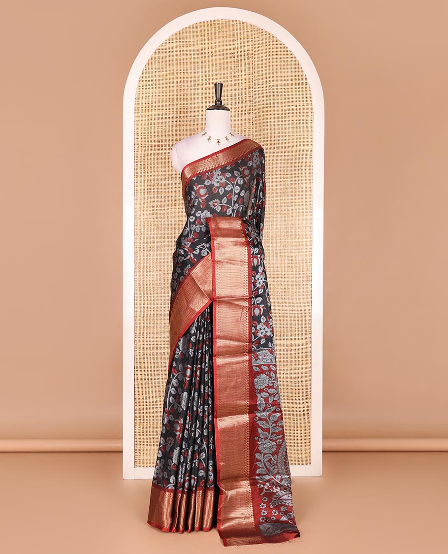Black Kalamkari floral vine and peacock printed dola silk saree, contrast traditional zari border, peacock printed pallu, and floral vine print blouse