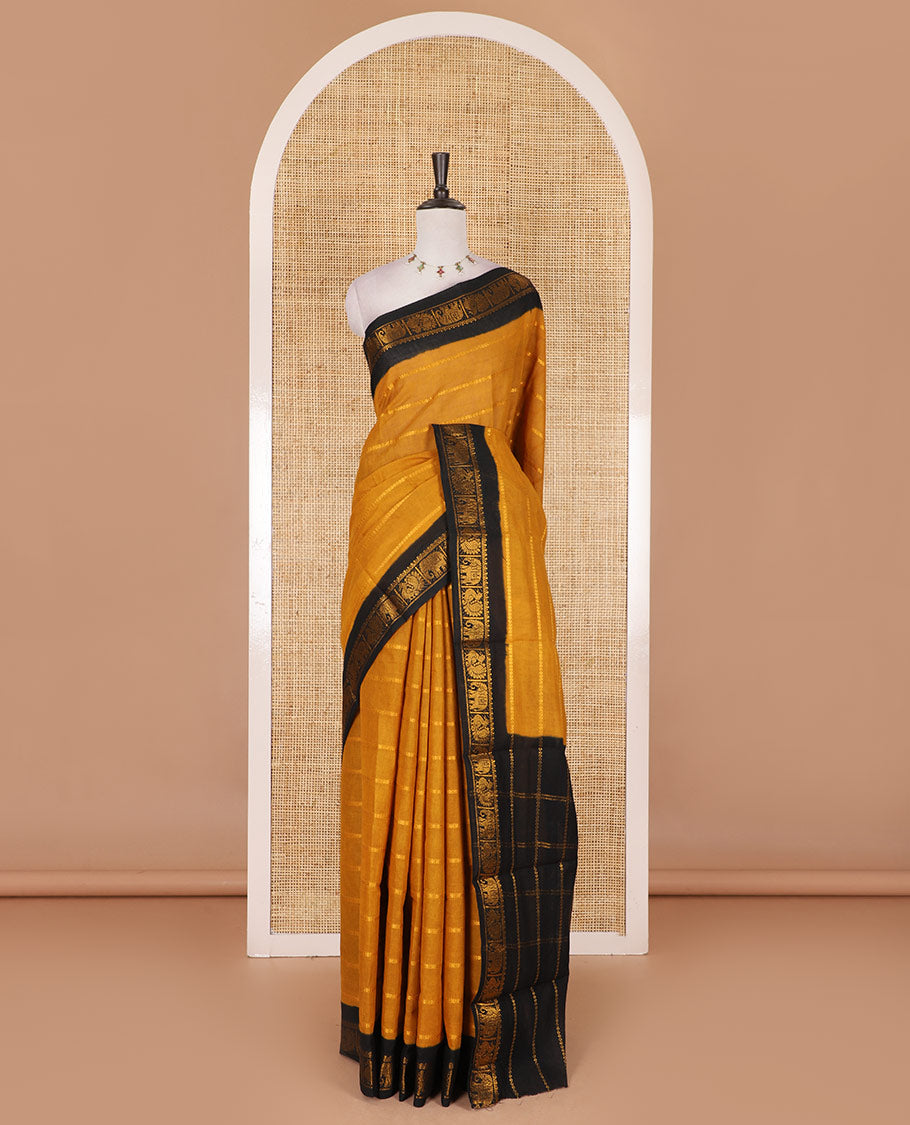 Mustard veldhari zari striped Sungudi cotton saree, contrast peacock and elephant motif border, striped pallu, and contrast zari design blouse