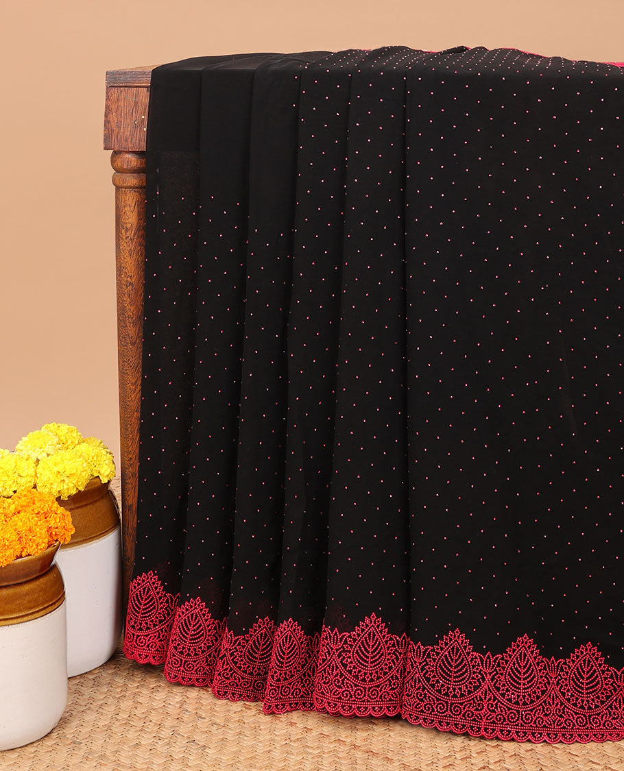 Black with pink all-over stone work chiffon georgette saree with self embroidery border & self pallu along with contrast stone work blouse