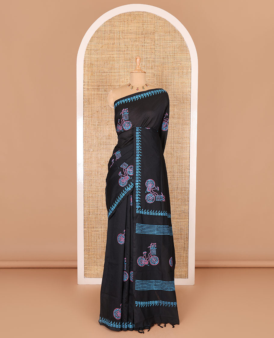 Black cycle with flower basket motifs block printed South cotton saree, Greek key motifs block printed border, a matching blouse, and a contrast floral motifs printed blouse