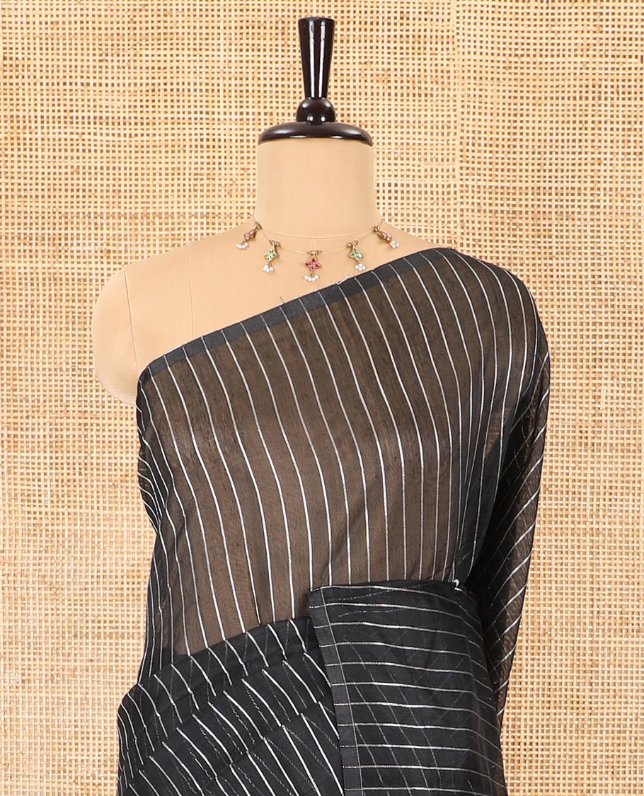 Borderless black silver zari vertically striped khadi mul cotton saree, gleaming zari pallu and a matching blouse