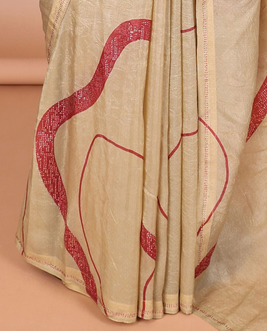 Cream with red fancy print, swarovski stone work cruncy crush saree, swarovski stone work border & self pallu along with swarovski stone work blouse