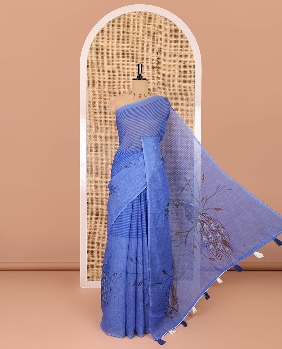 Borderless blue striped and peacock-motif-printed skirt-style linen cotton saree with a self-pallu of peacock print and a matching blouse
