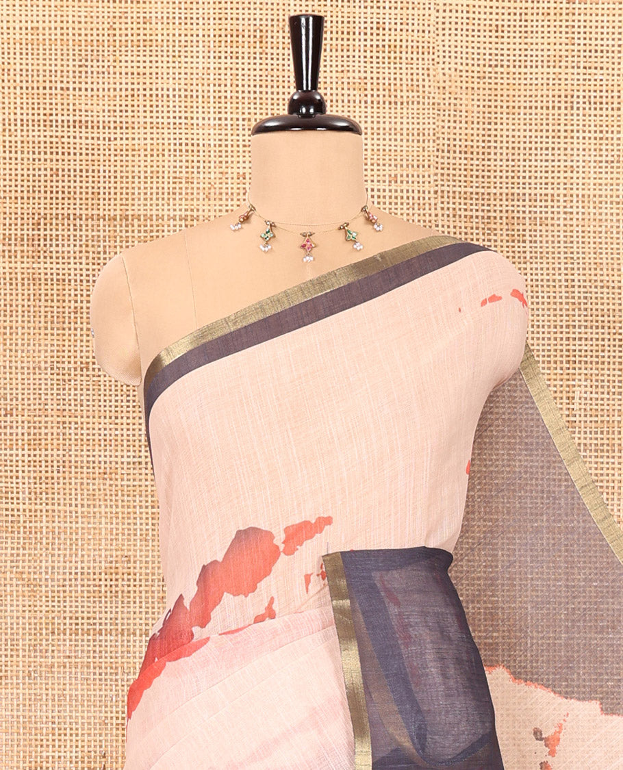 Peach shibori printed linen cotton saree, contrast piping zari border, shibori circle printed pallu, and a contrast shibori printed blouse