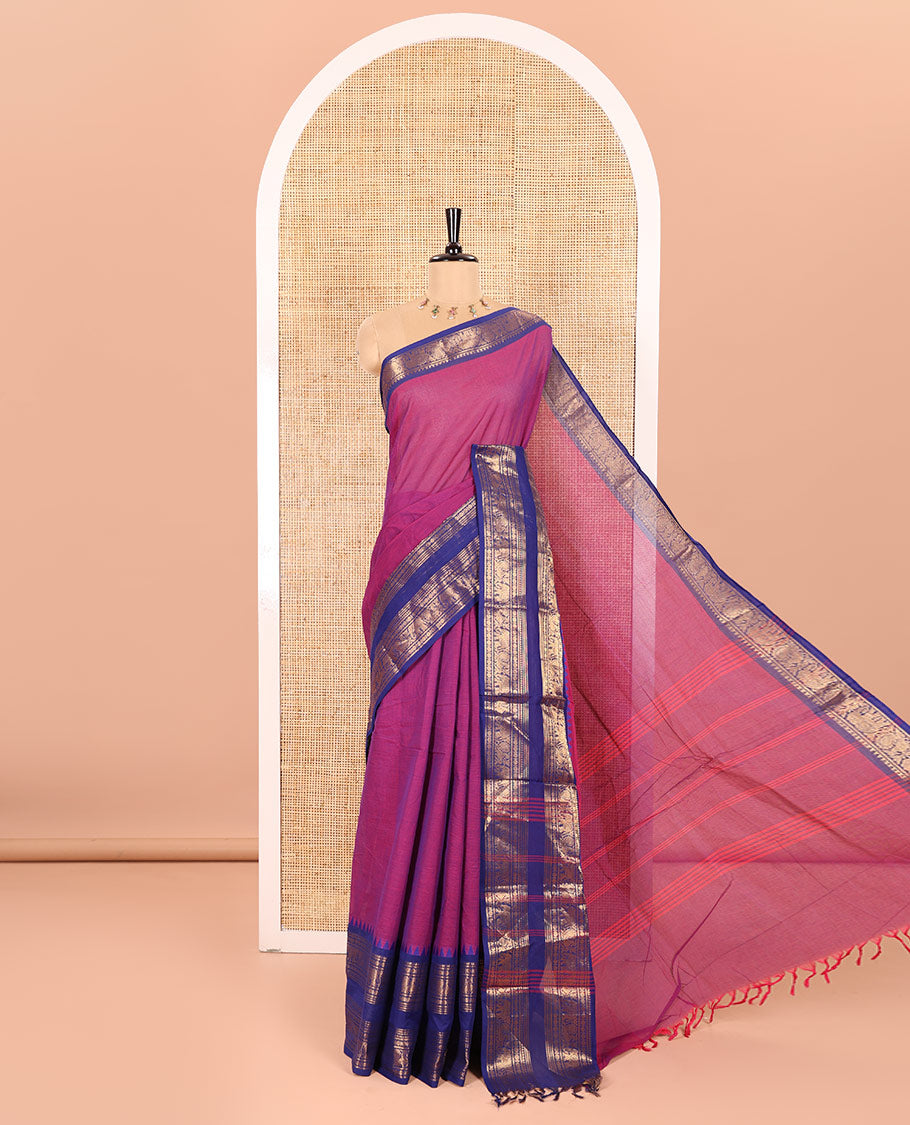 Magenta Plain Chettinad Cotton Saree Beautified with a Contrasting Temple Rettai Pettu Border of Peacock-Elephant Motifs, a Subtle Pallu of Stripes, and a Matching Blouse