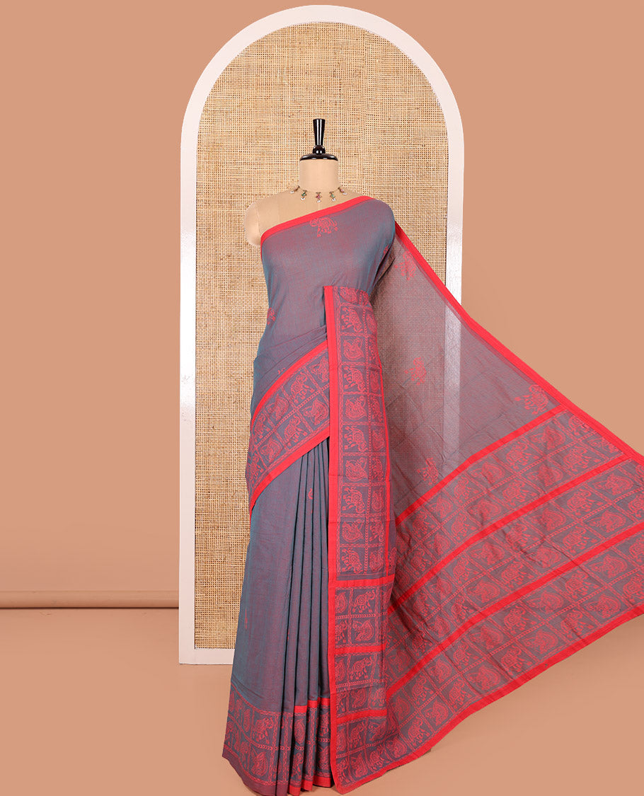 Purple Mangalagiri Cotton Saree Decked Up with Elephant Motifs Block Print All Over Its Body, Subtly Printed Border of Animal Butta Enclosed Checks, Pallu Mirrors the Same Border Print, and Paired with a Contrast Printed Blouse