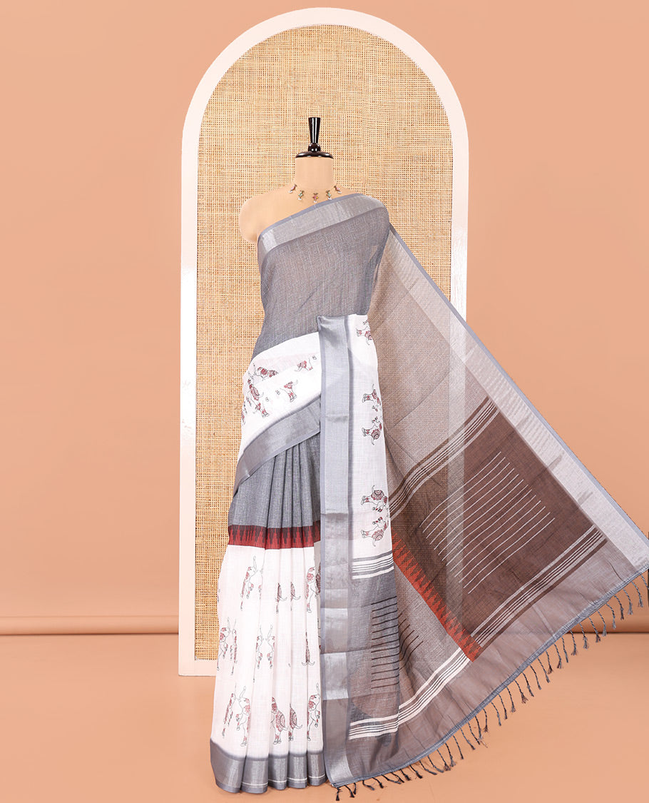 Cream and Grey Linen Cotton Saree, Subtly Sparkled with Half-and-Half Style and Elephant Motifs Printed On Its Body, Highlighted by Zari Border, Pallu of Same Print, and Paired with a Printed Blouse