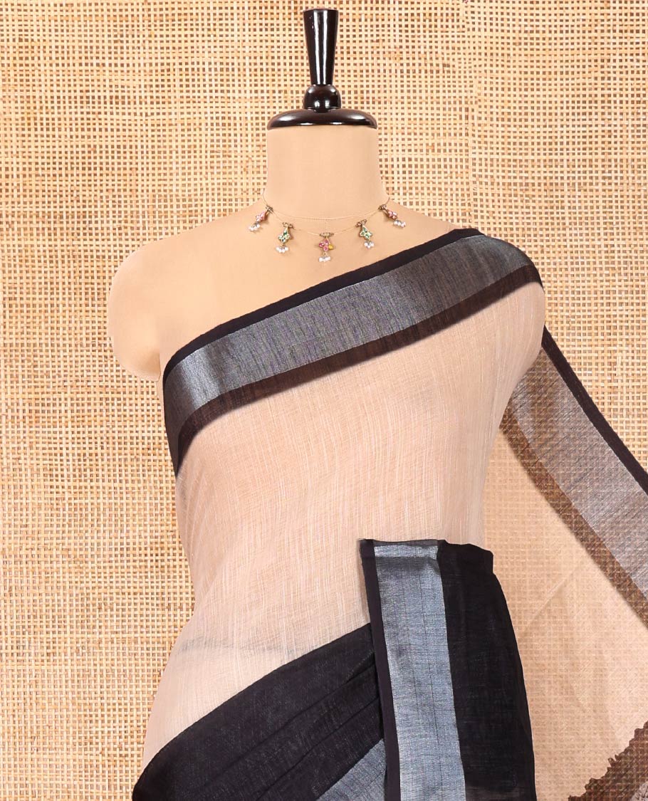 Chikku and Black Linen Cotton Saree, Subtly Designed with Half-And-Half-Style Dual-Color Dye on Its Body, Complemented by a Contrast Bavanji Border, Pallu of Batik Print, and Paired with a Contrast Blouse