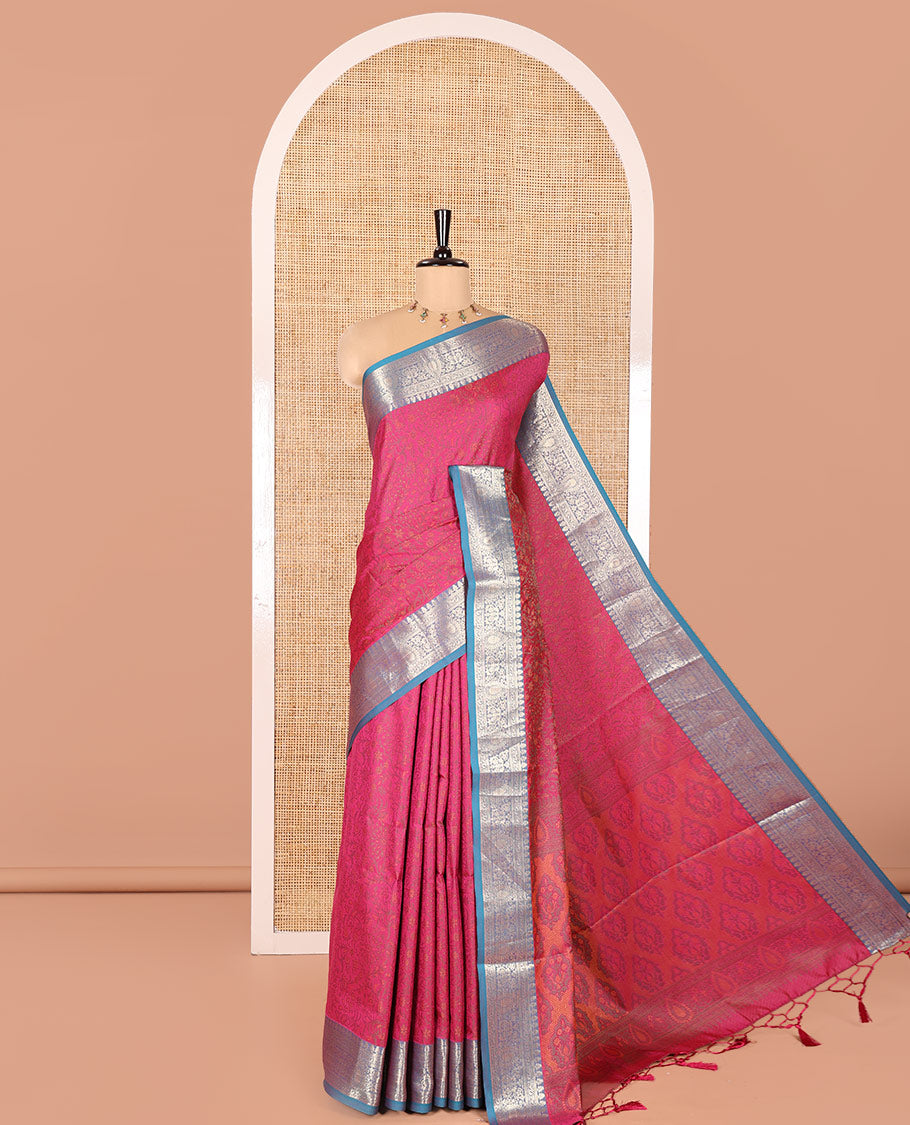 Rani Pink Elite Soft Silk Saree, Subtly Sparkled with Floral-Paisley Designs On Its Body, Complemented by Contrast Traditional Zari Designs Woven Border, Intricately Designed Pallu, and Paired with a Matching Blouse