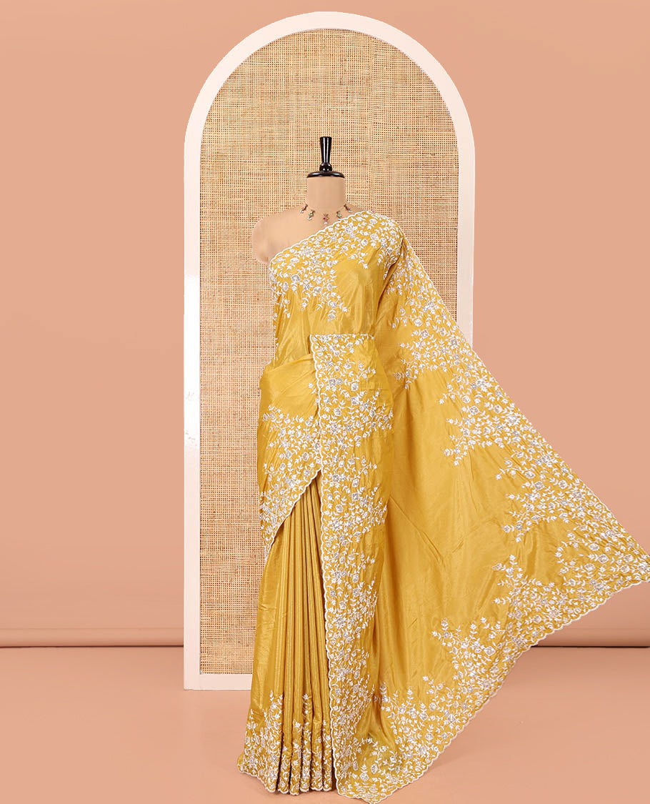 Mustard Plain Satin Crepe Saree, Accentuated with Floral Vine Thread Embroidery on Its Border, a Self-Pallu, and Paired with a Matching Blouse