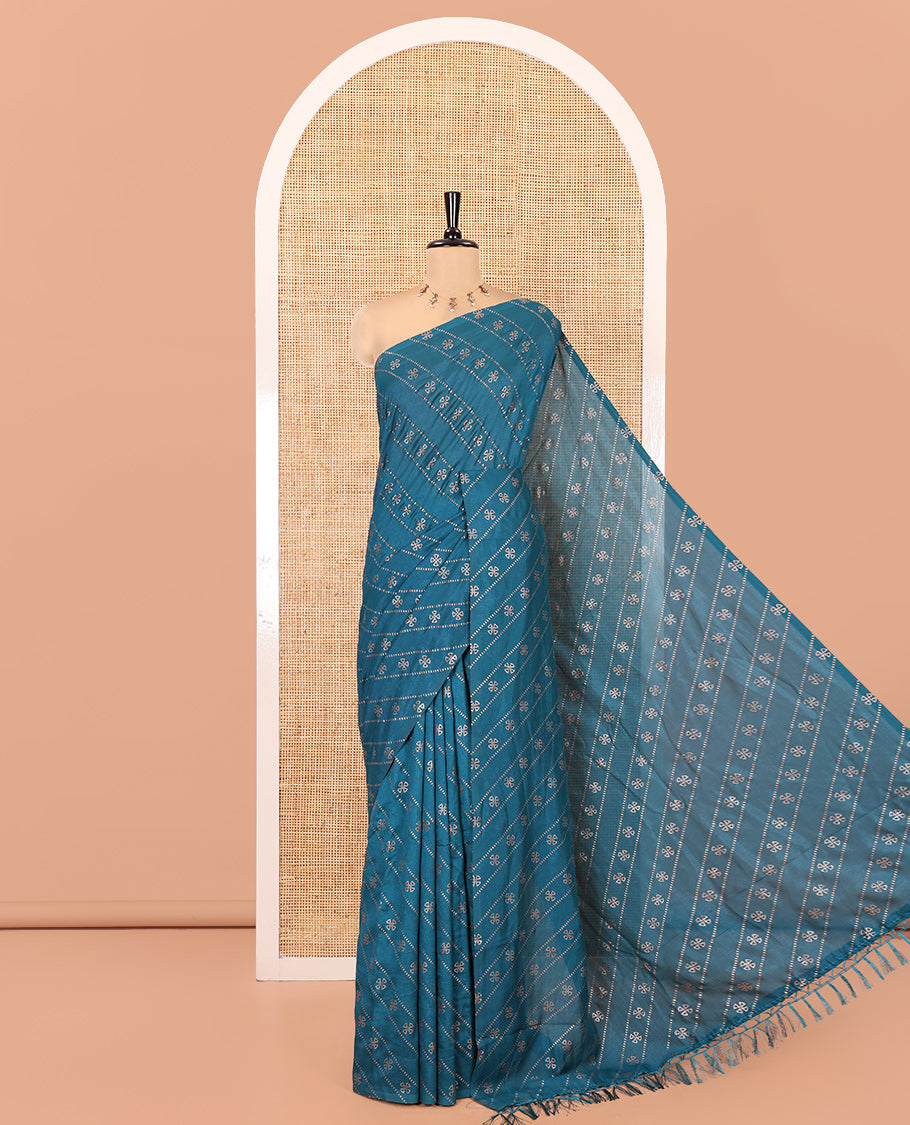 Borderless Peacock Blue Vichitra Silk Saree, Gleamed Up with Floral Buttas and Leheriya-Style Foil Print on Its Body, a Self-Pallu, and Has No Blouse