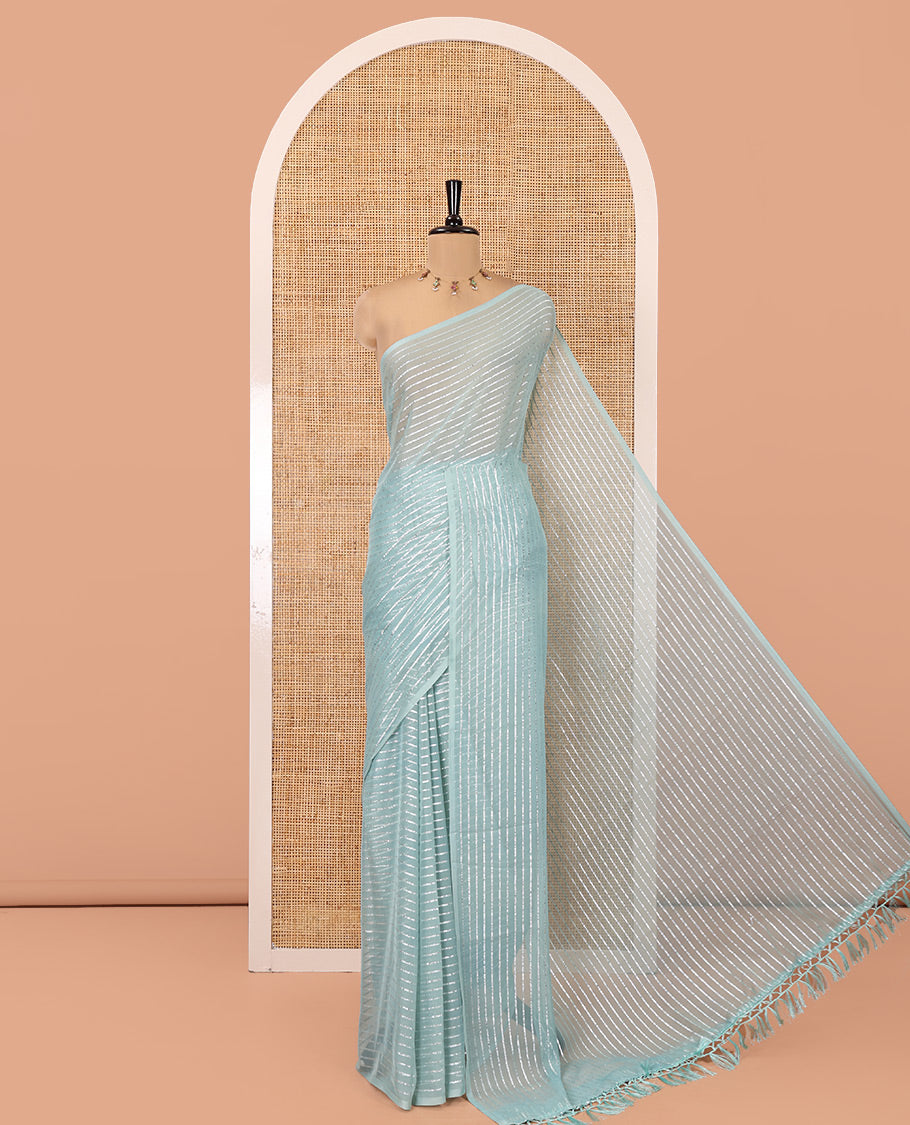 Borderless Sea Green Chiffon Saree, Gleamed Up with Horizontal Stripes on Its Body, a Self-Pallu, and Has No Blouse